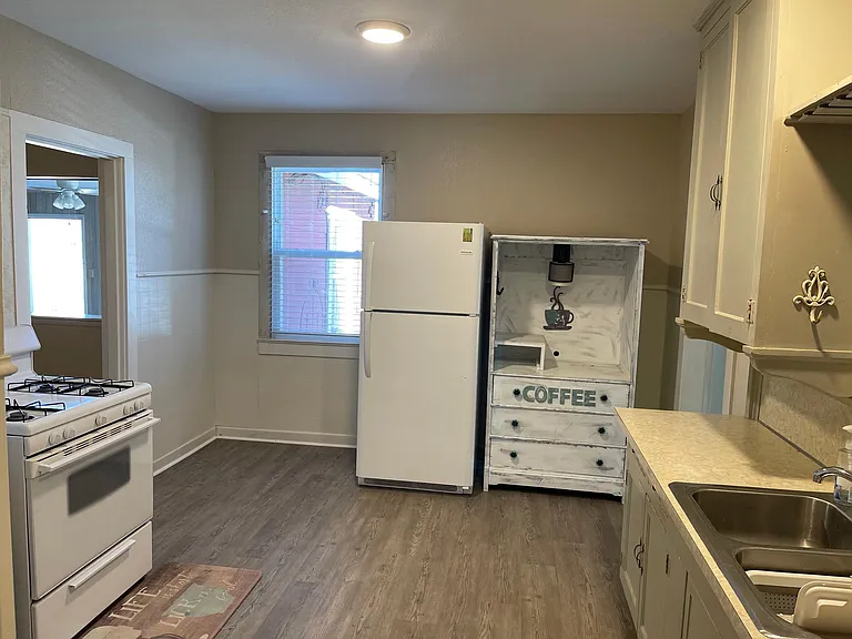Kitchen with gas stove, coffee station