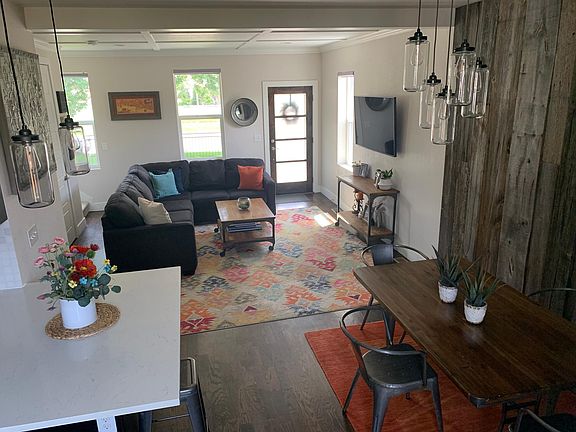Main floor living room, dining room and kitchen.