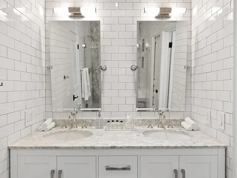 Dual mirrored His and Her sinks for extra comfort.