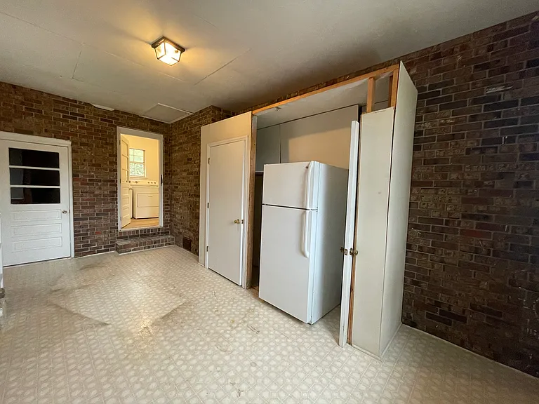 Bonus Room (w/ shelves, storage space, and extra refrigerator)