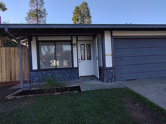 Closer view, covered porch with gutters