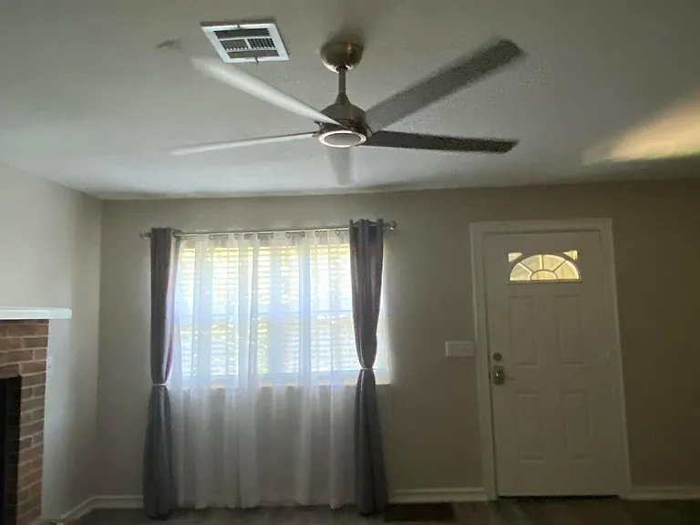 Open space view, new blinds, curtains and sheers.