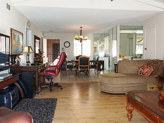 Living room, office, and dining room