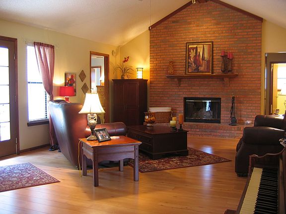 Large family room with brick fireplace