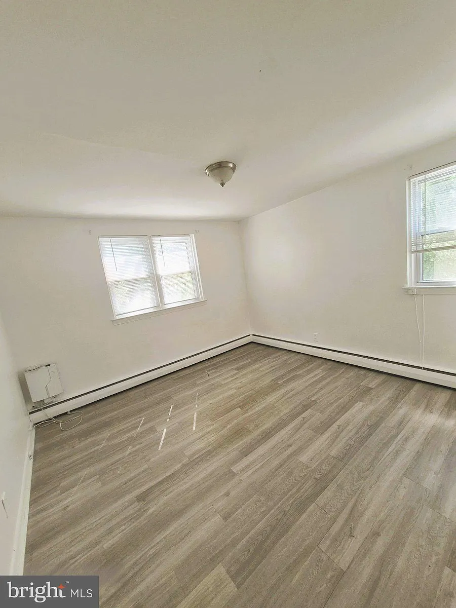 Building Photo - 6486 Matthews St #2