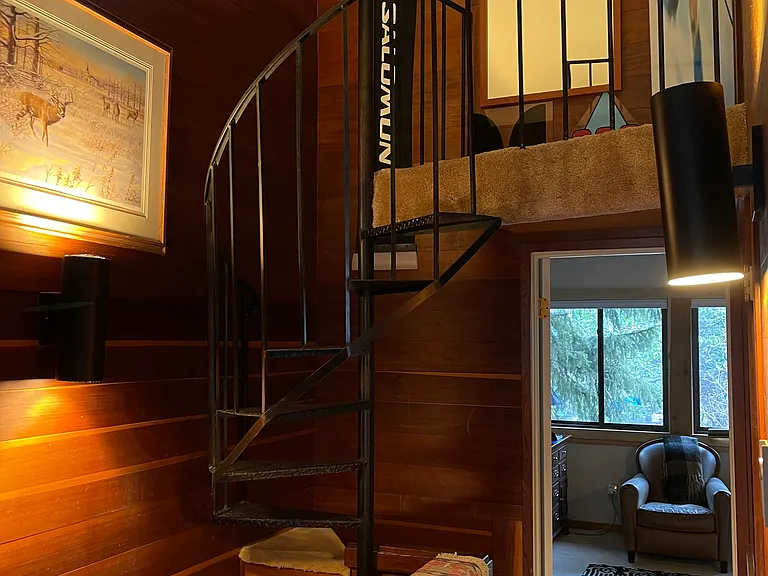 Master bedroom,loft, 3 story hallway, and redwood walls.