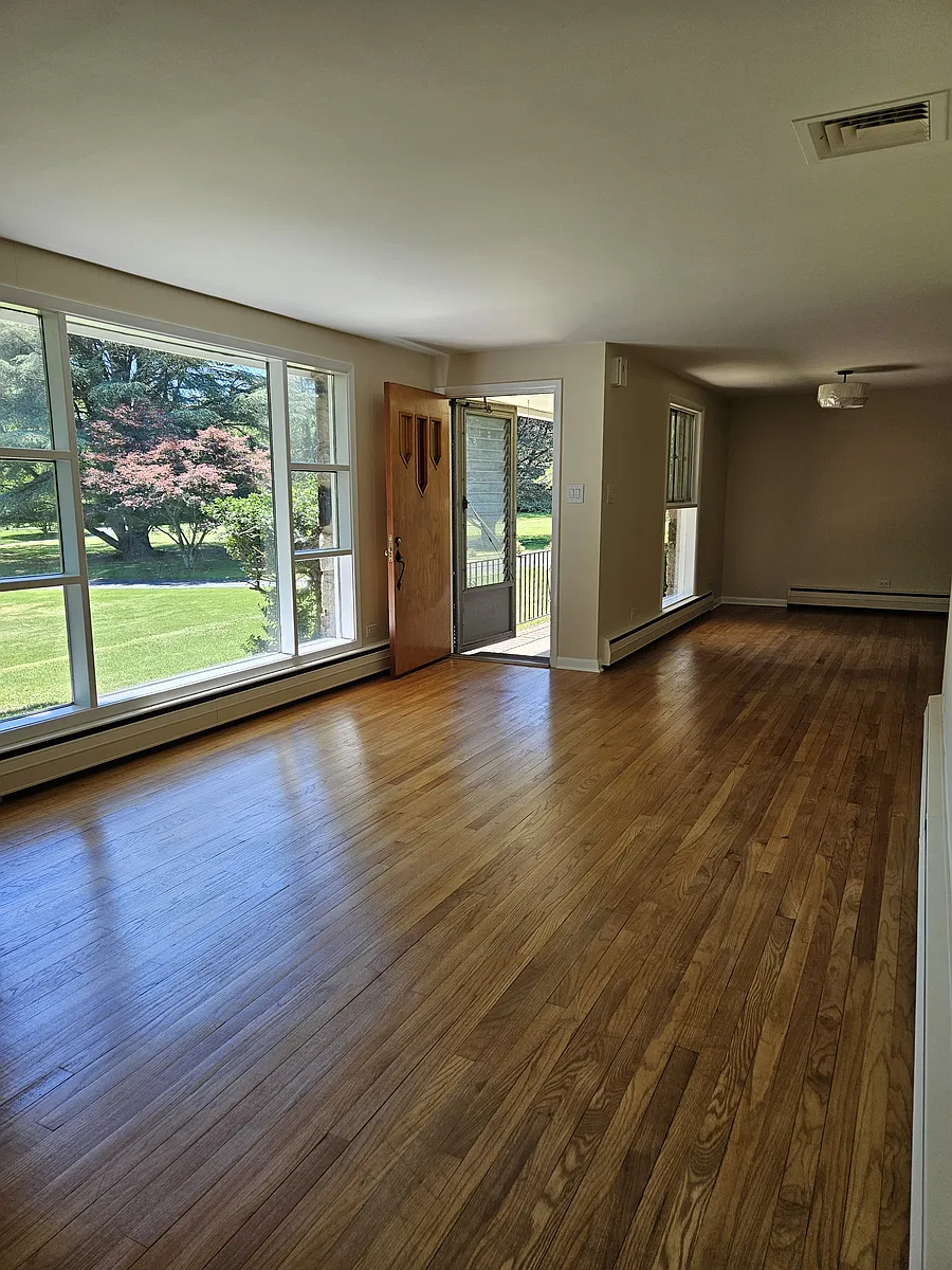 Livingroom with picture window, front door to front porch, diningroom off kitchen - 981 Smithbridge Rd