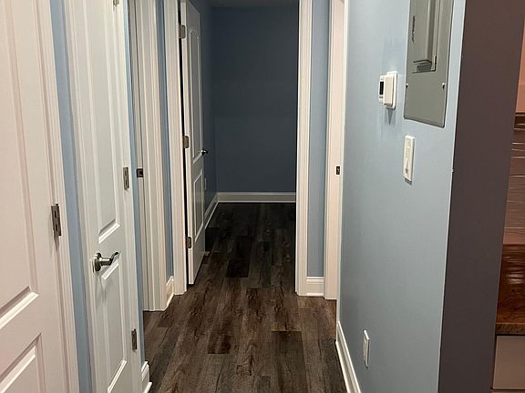 Newly renovated condo includes brand new air conditioner and thermostat.