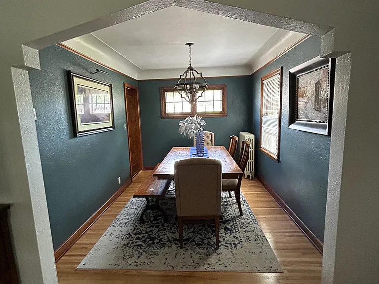 Dining room table seats about 7 people