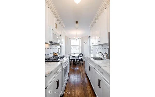 Sold by Douglas Elliman | media 13