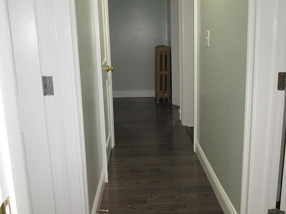 HALLWAY LEADING TO BEDROOM AND BATHROOM