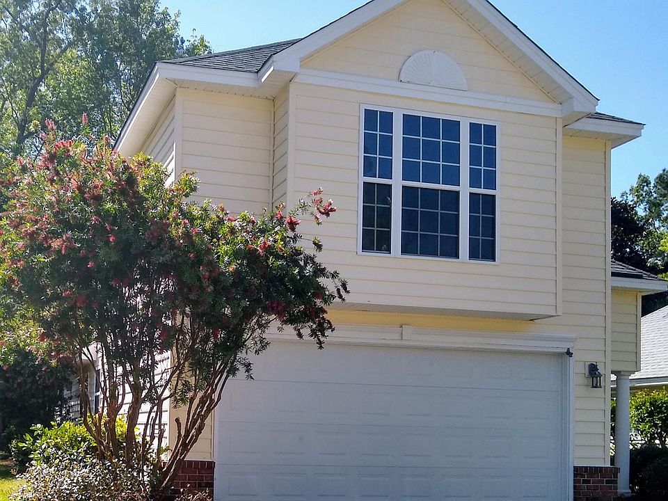 Two car garage and driveway for two cars.