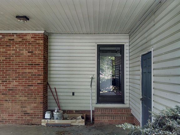 carport entry, storage room