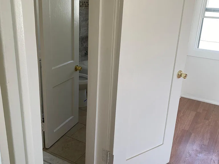219 E 28th St #3/4 — Photo 15