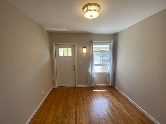Main room Kitchenette behind camera. BBQ area/ patio outside window.