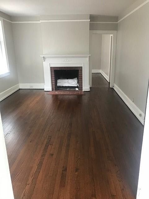 Living Room - Walnut floors, working fireplace