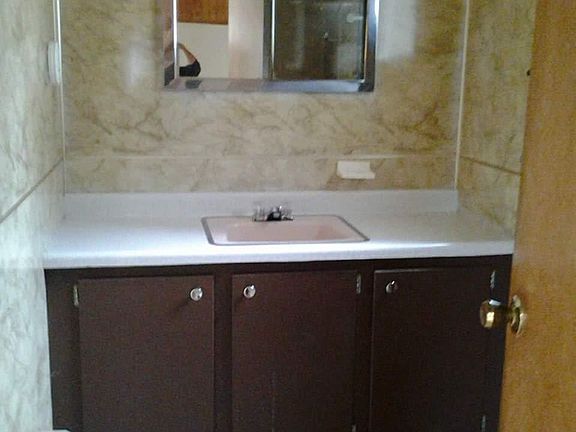1/2 BATH first floor? Toilet behind door. Updated lighting