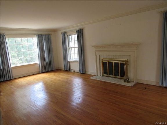 Front to back living room with fireplace