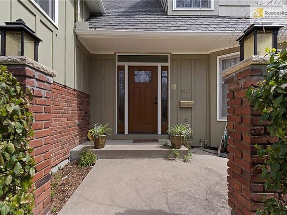 A beautiful newer front doorway with leaded-glass glazing welcomes you home in style.
