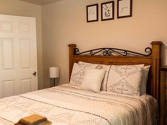 Queen Bed with sheets and pillows Included