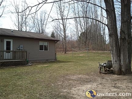 back of house w/ clothes line