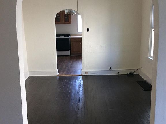 middle room leading into kitchen 
