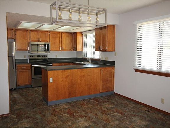 Kitchen and DIning with new stainless appliances