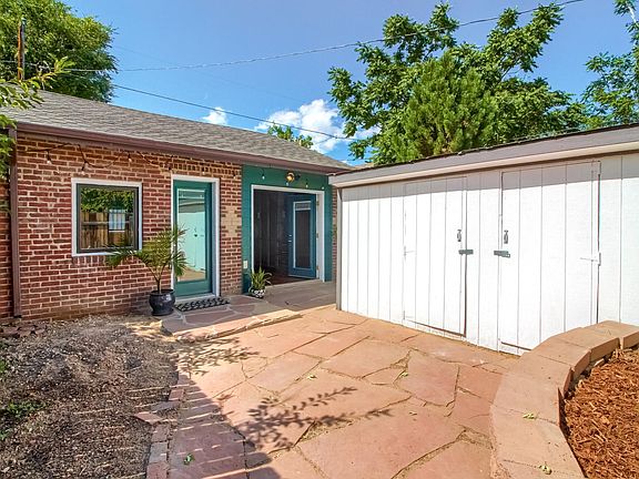 Front entrance w./ storage shed.