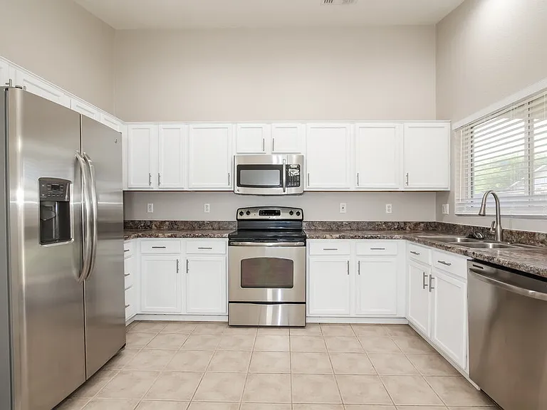 15434 W Gelding Dr — Photo 6