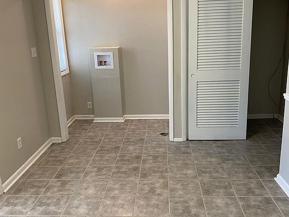 Washer and dryer hook ups with large pantry