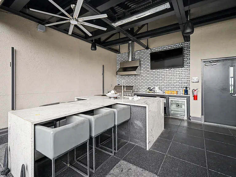 The community terrace has THE best views of the Uptown skyline, two fire places, a new grill and bar, and TVs. Perfect for hosting, can be rented through the HOA for private events
