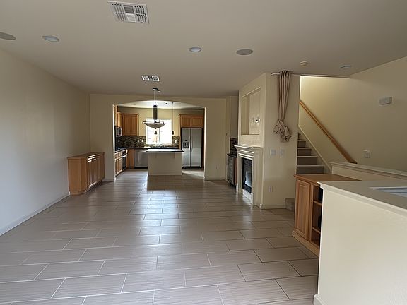 Open concept living, dining, and kitchen