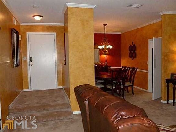 Photo shows condo when occupied. All walls have neutral pain