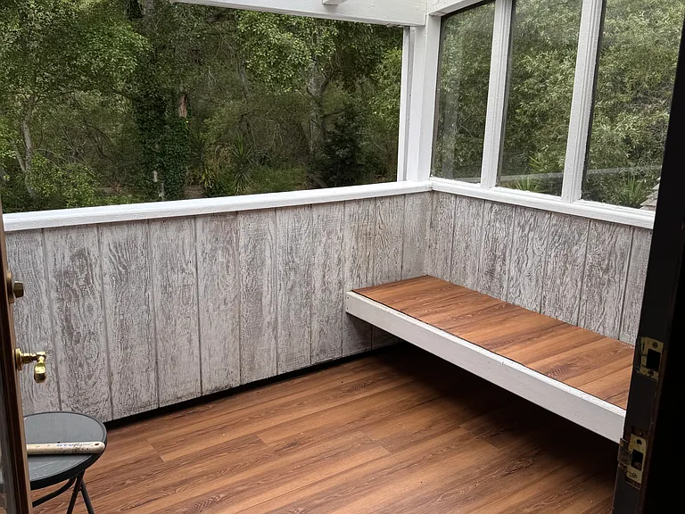 covered porch off of living room