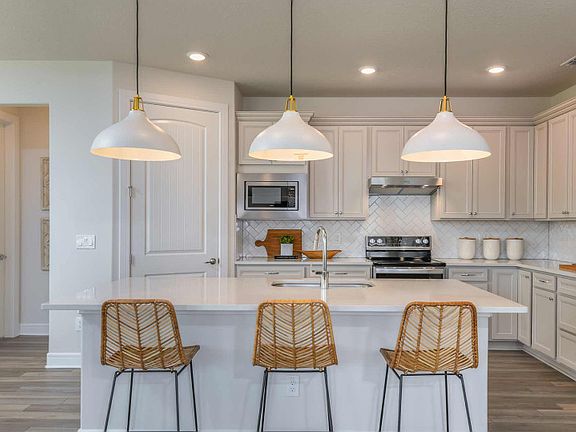 Open Kitchen with Island and Large Pantry