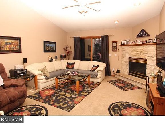 Main floor living room is open to the kitchen and dining rooms.  Opens up to a deck with stairs to the fenced backyard.