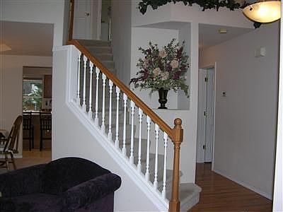 Open floorplan leading upstairs.