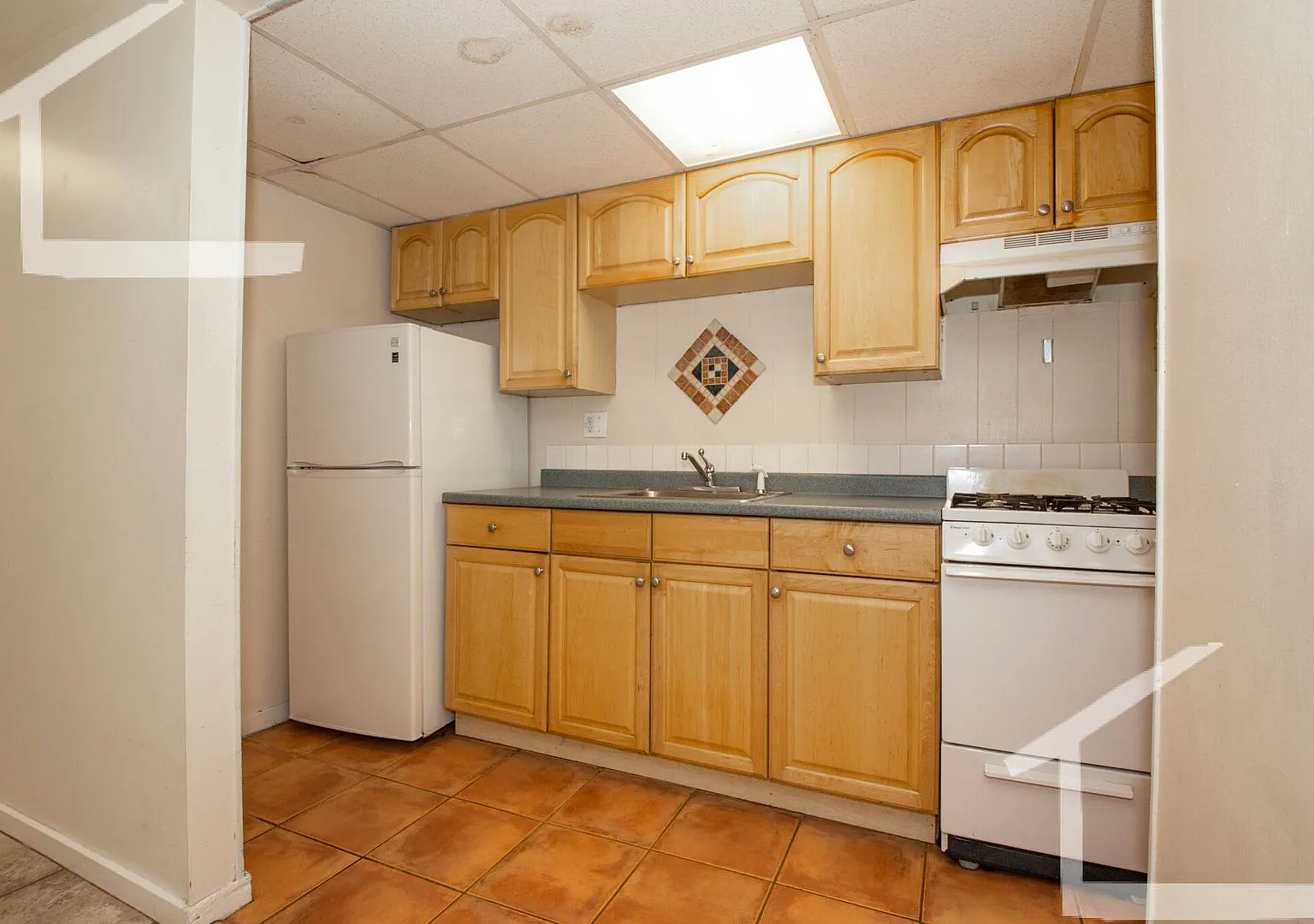 1beds basement apartment in Allston is now available — Photo 1