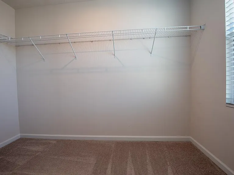 Spacious Walk In Closet with Window