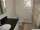 upstairs hall bath NEW everything jetted tub