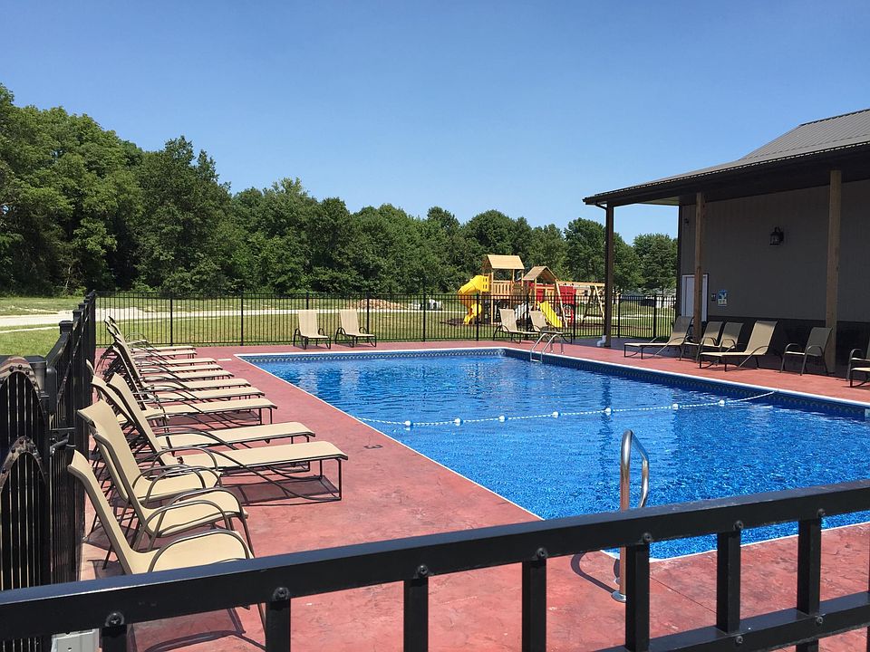 Pool with playground in the background