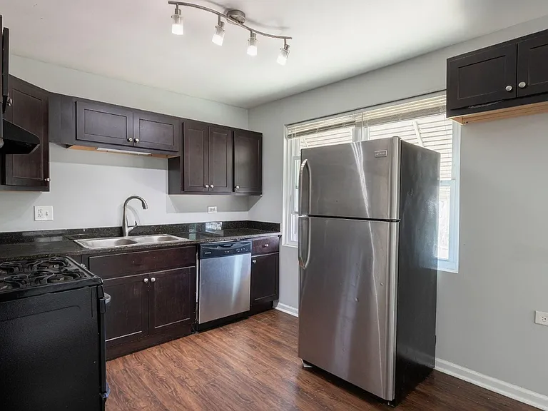 5834 W Irving Park Rd #1R — Photo 1