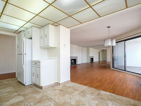 Kitchen opens up to Dining Area