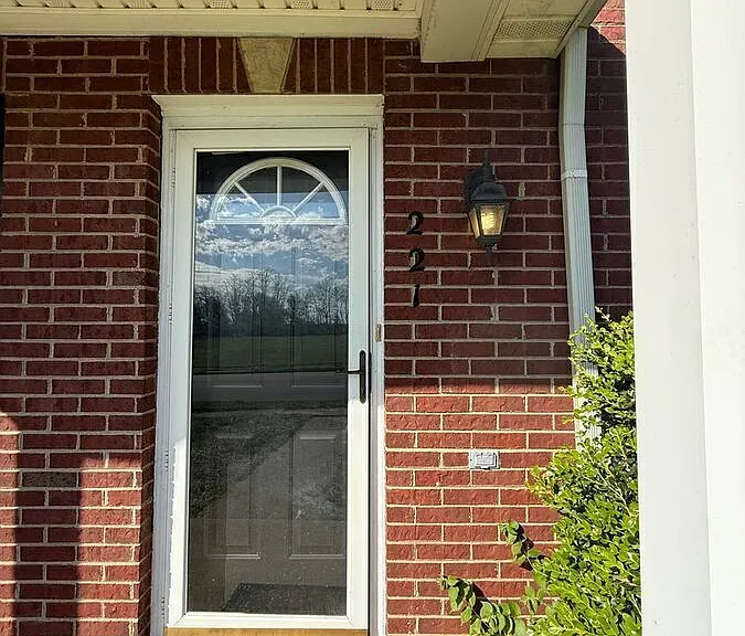 221 John Sutherland Dr — Photo 1