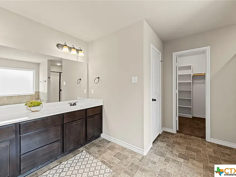 Master Bathroom (flooring in photo is old)