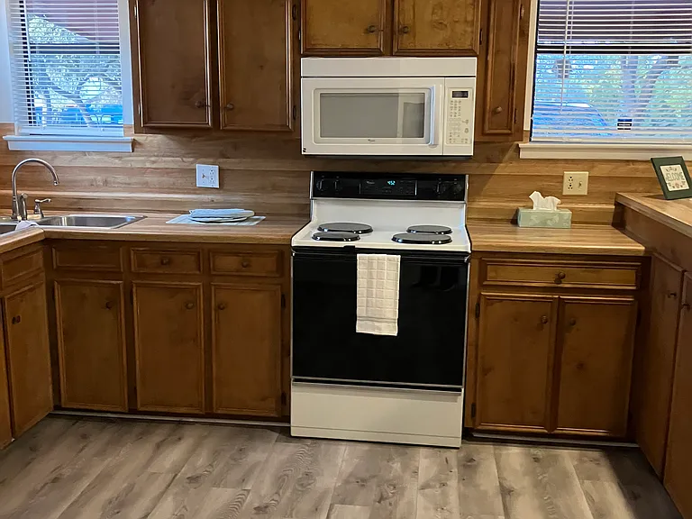 Tons of cabinets in this large kitchen