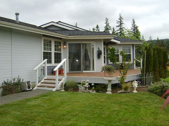View deck of mountains and lake in season, southern exposure for sun and gardening
