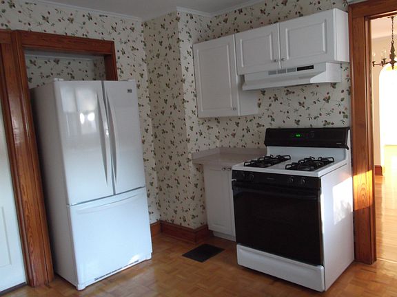 Kitchen w/new appliances (currently updating wallpaper)