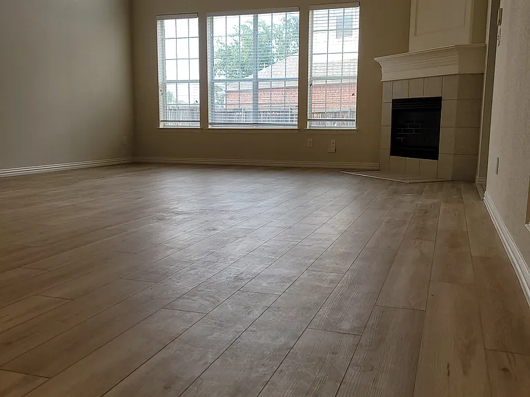 living room 28 feet height open ceiling with view of back yard