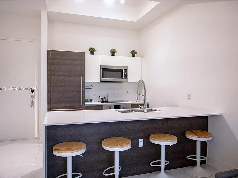 301 Altara Ave #202 — Photo 2